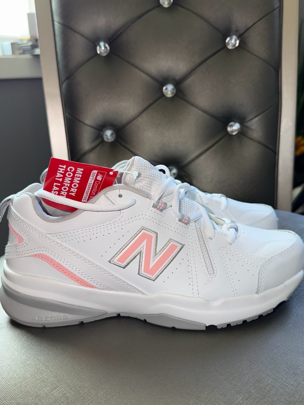 New Balance Women’s White Sneakers with Pink Accents